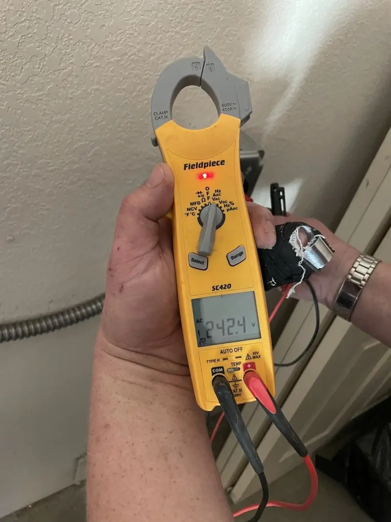 Voltage testing with clamp meter during Generator Installation in Vassar